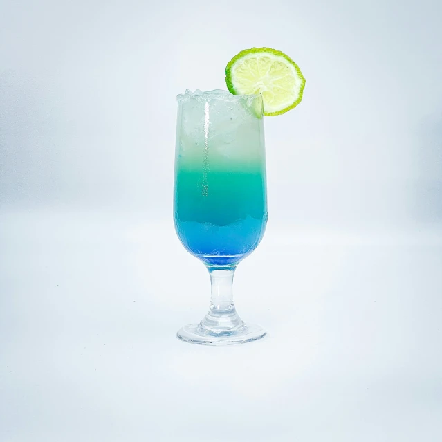 a very fancy looking blue and green drink