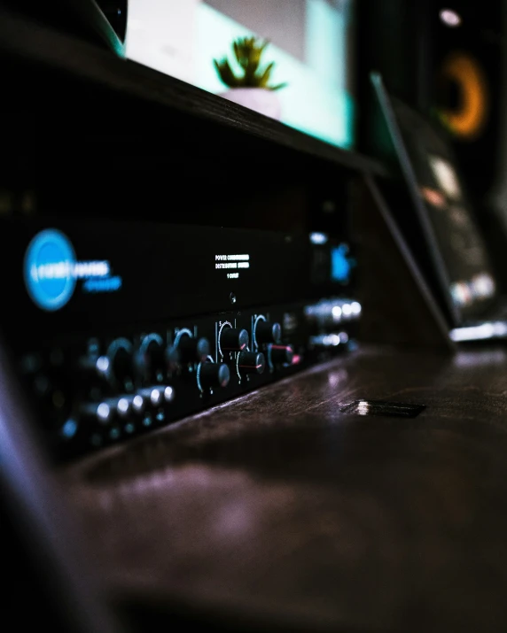 a computer keyboard on a table with a blurry background