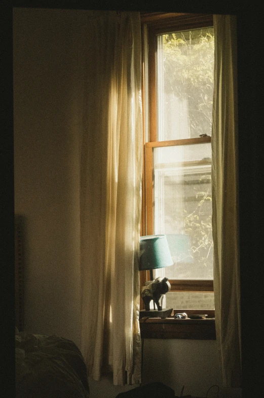 a lamp sitting on top of a table in a room