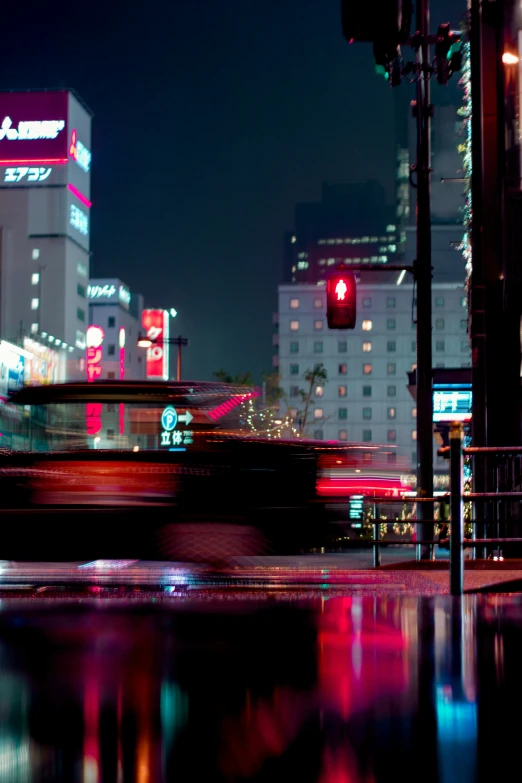 a building sits in the city at night