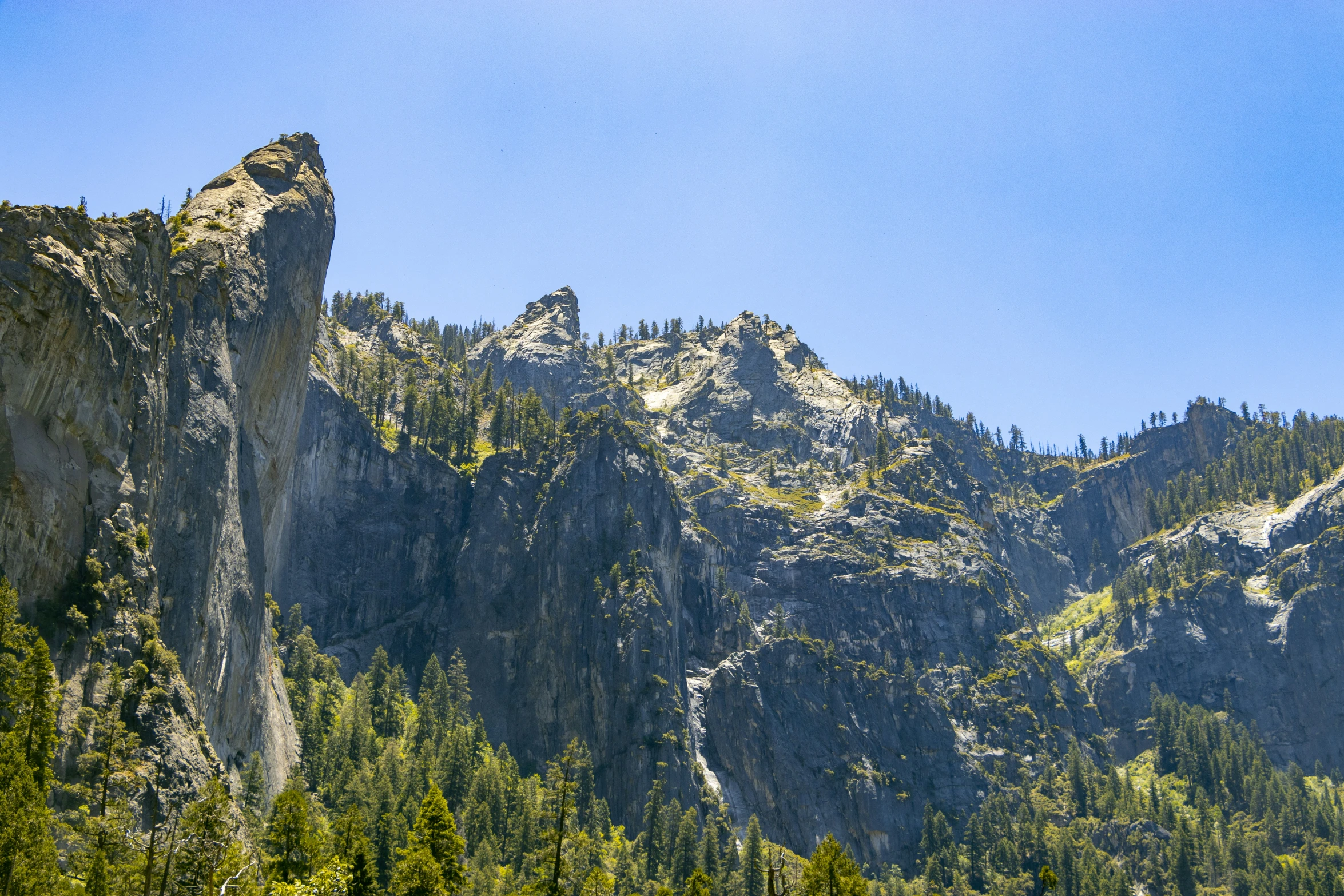 the top of a mountain with a clear sky