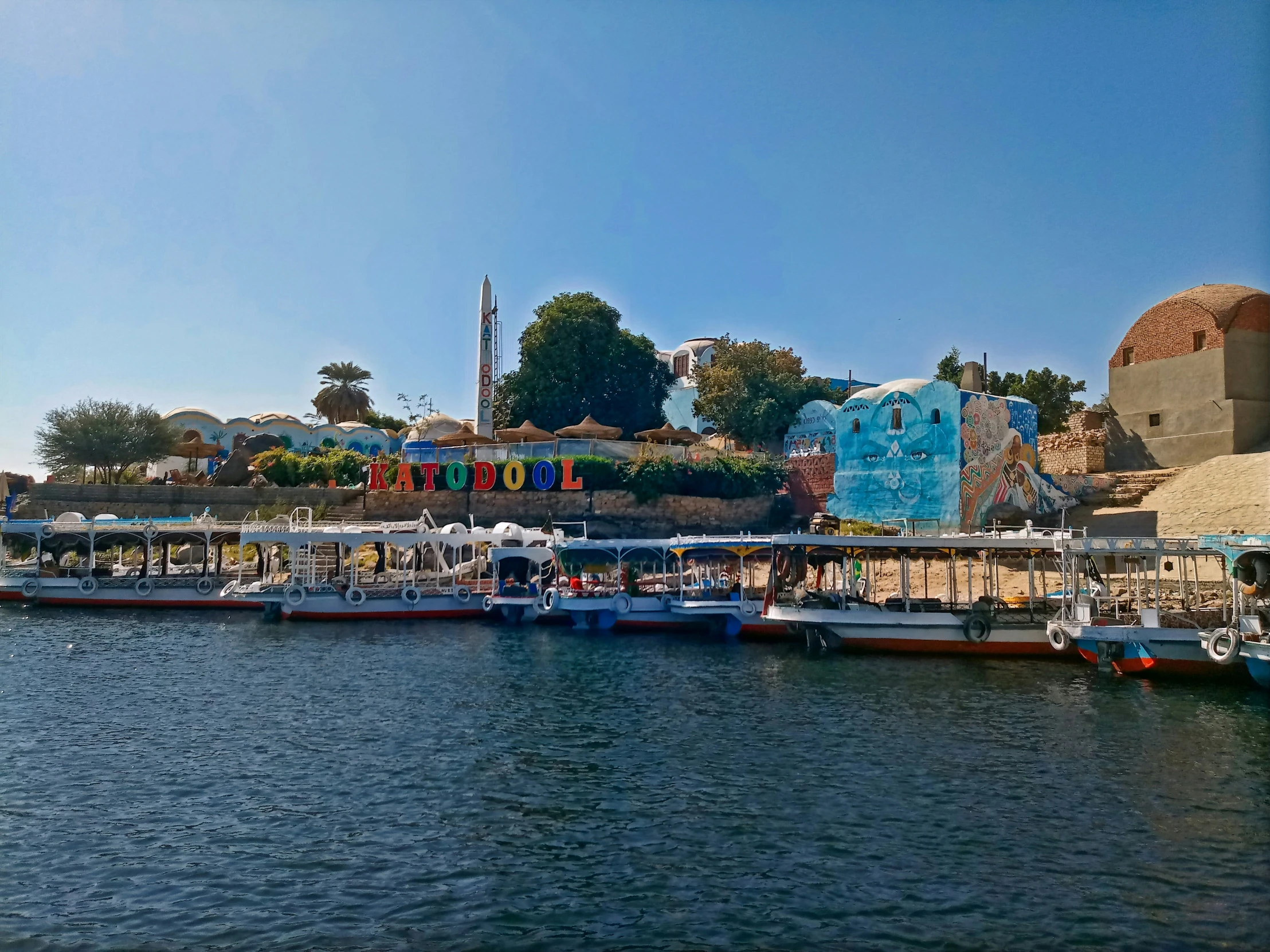 there are many small boats parked at the docks