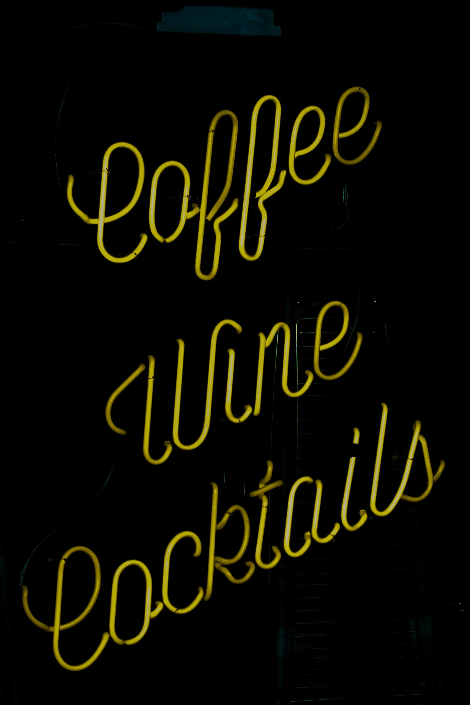 neon sign reading coffee, wine and cocktails