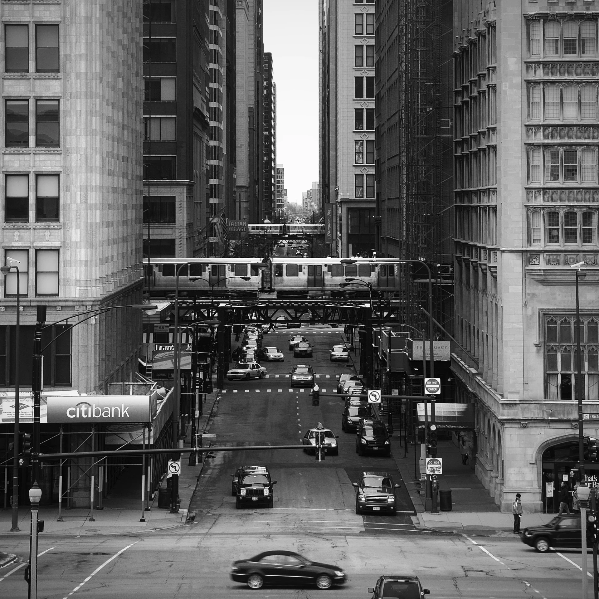 a subway train coming down the track in the city