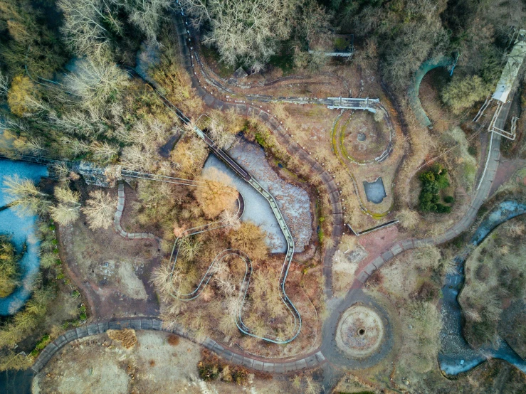 an aerial view of a scenic park that looks like it has fallen leaves