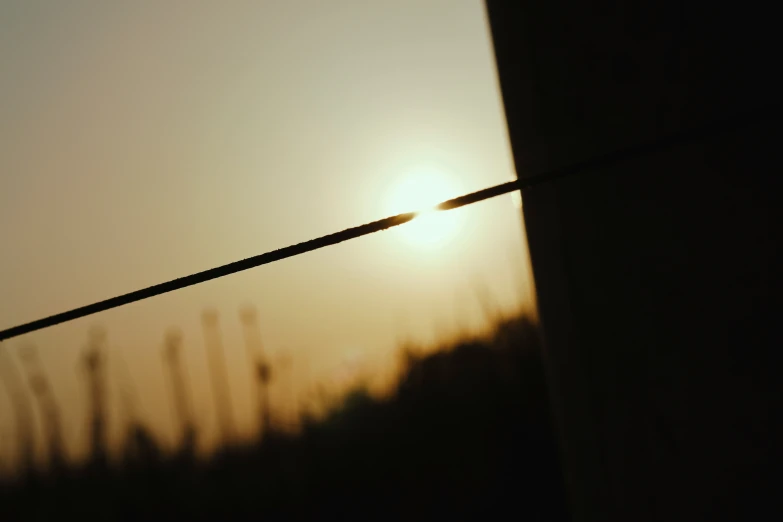 a wire is close to the sun, and is in view