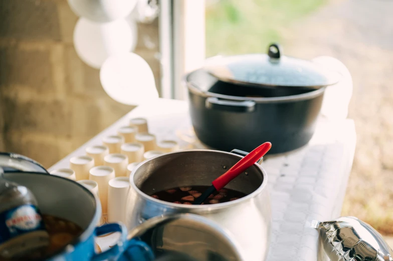 the pot and pans are empty on the counter