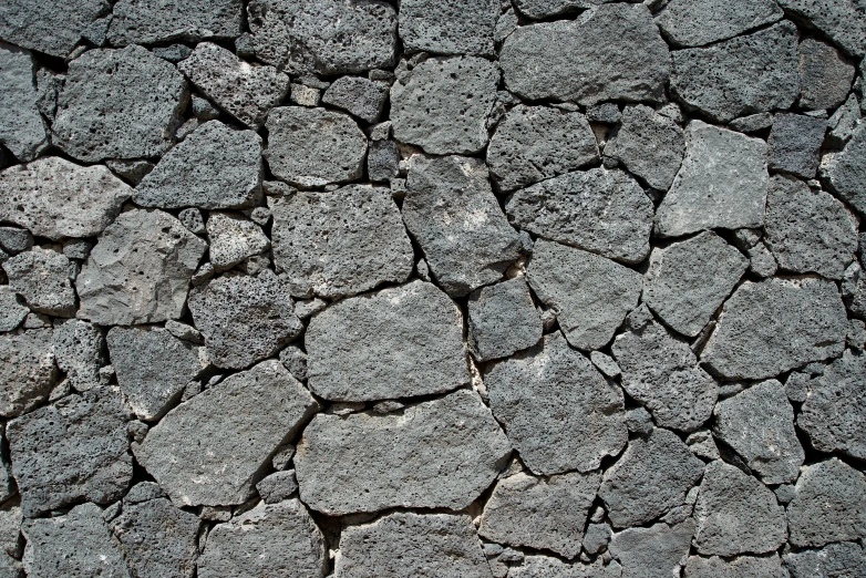 large number of gray rocks stacked together