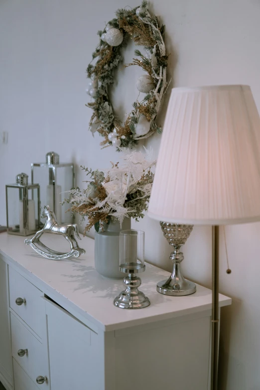 the christmas wreath sits on the wall with its lights turned off