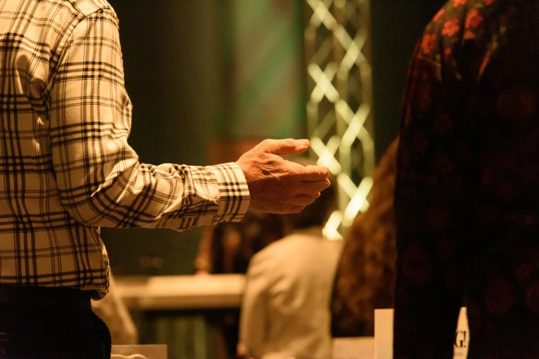 a man giving an presentation at the conference