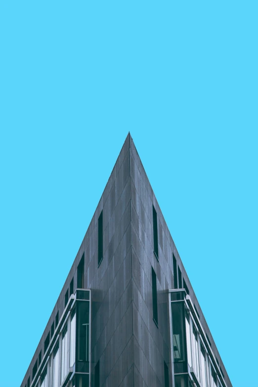 an image of a building looking up at the sky