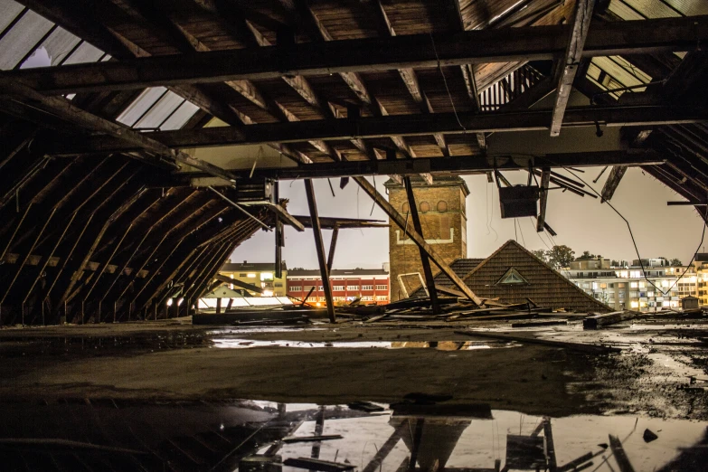 a wooden structure that has been blown off by water