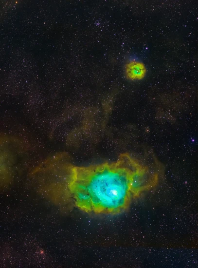 an image of two different colored objects in space