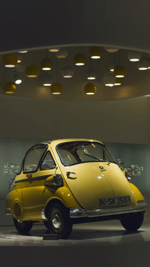 a little car is shown parked in a room