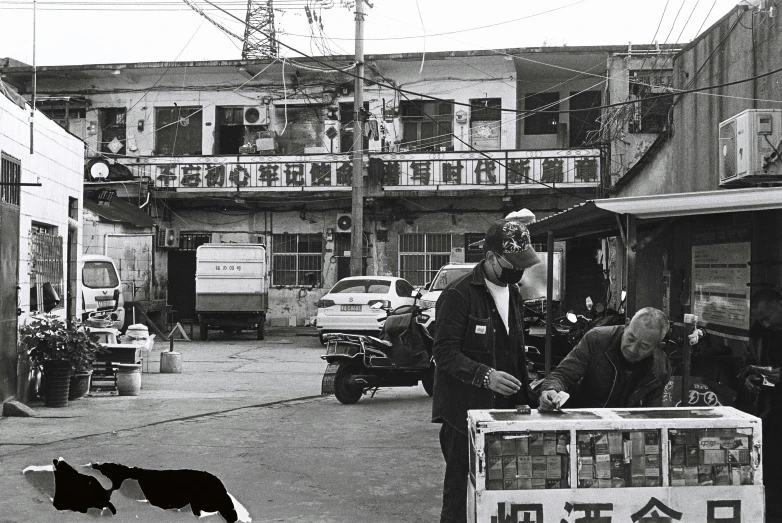 an old po of an asian town with a dog