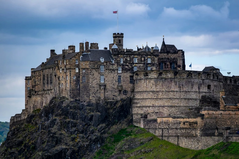 an ancient castle is on the hill top