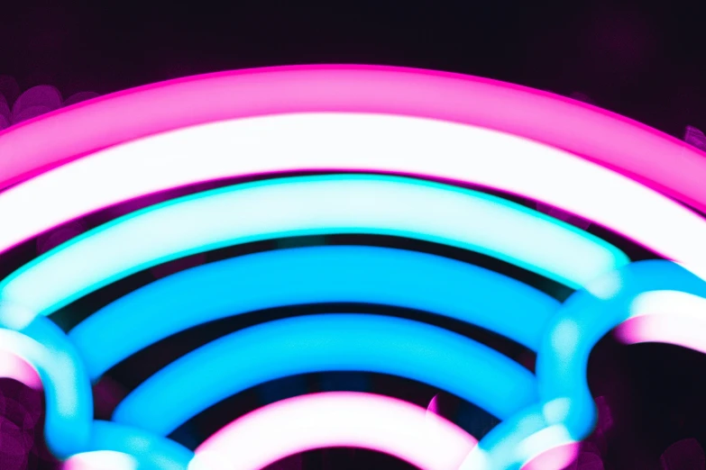 this picture depicts glowing neon light circles