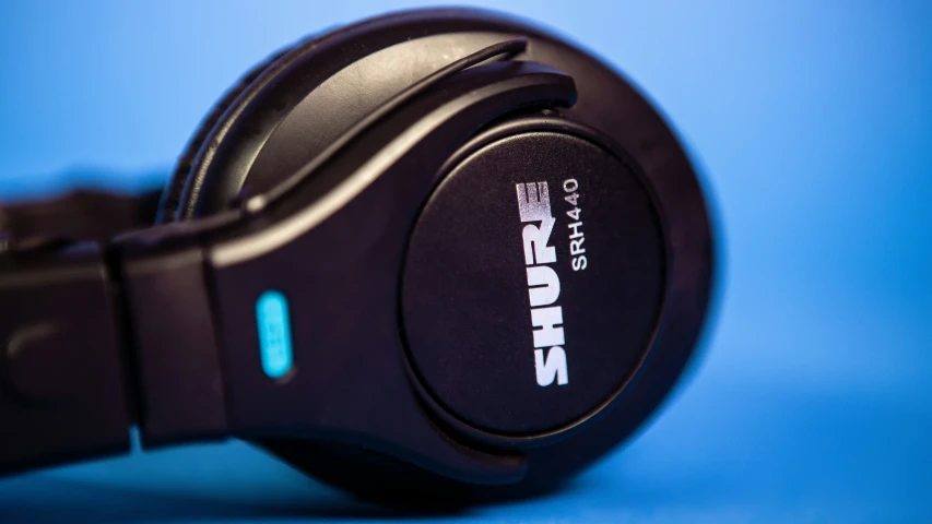 a headphones that are closed against a blue background