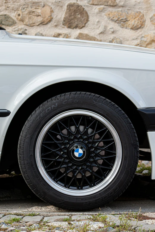 a close up view of a bmw car wheel