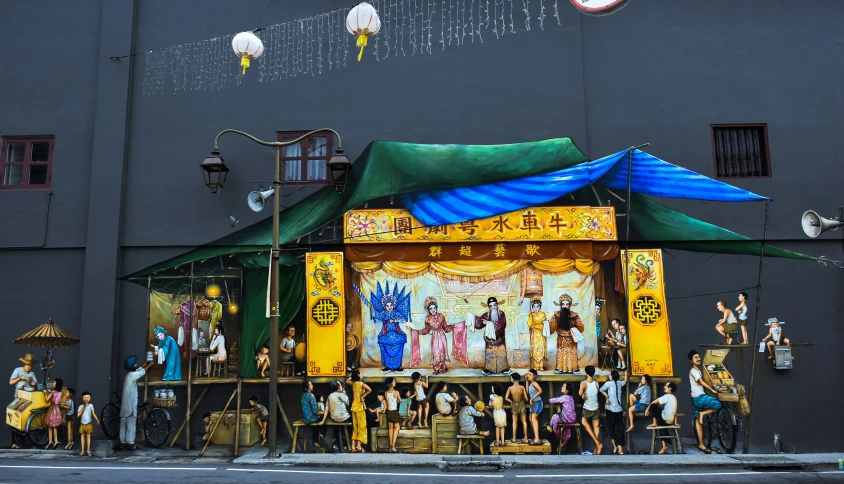 an outdoor store with dolls and a tent