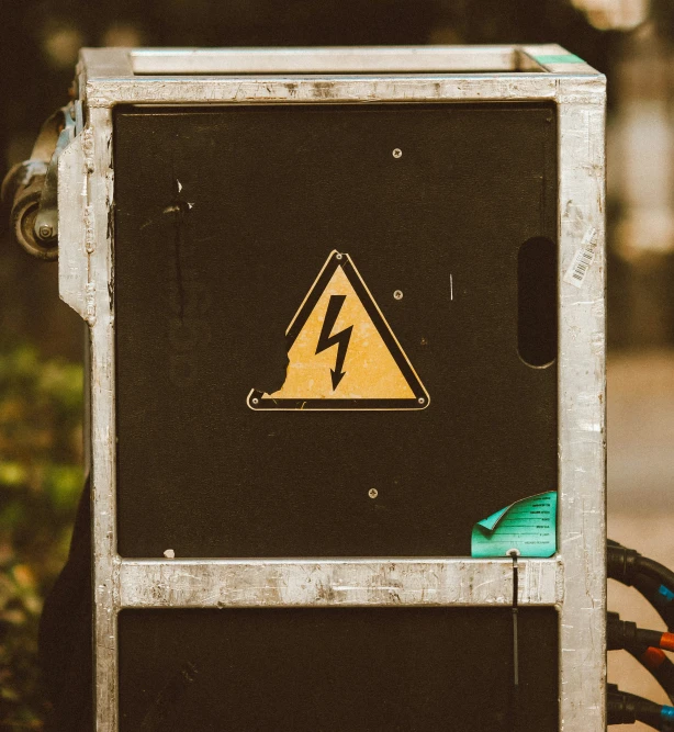 the back of a power box with the warning sign posted