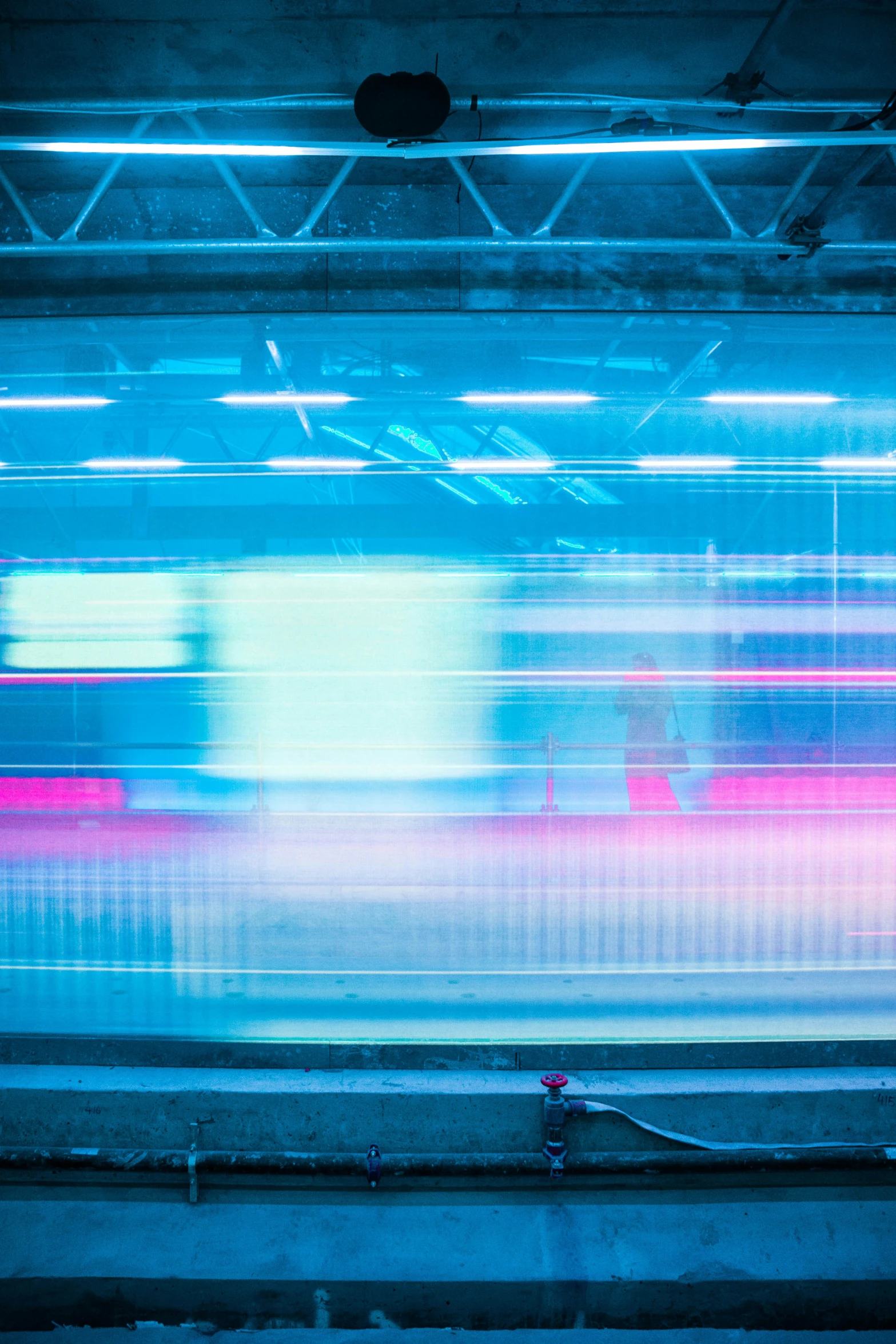 a long exposure po of a bus in the subway