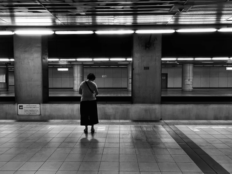 the lone man is in an empty station