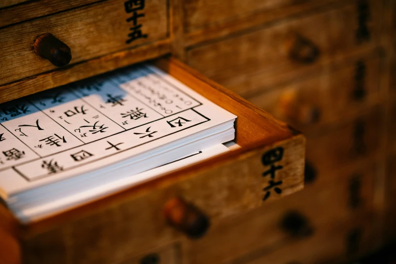 a wooden box has a clock on it