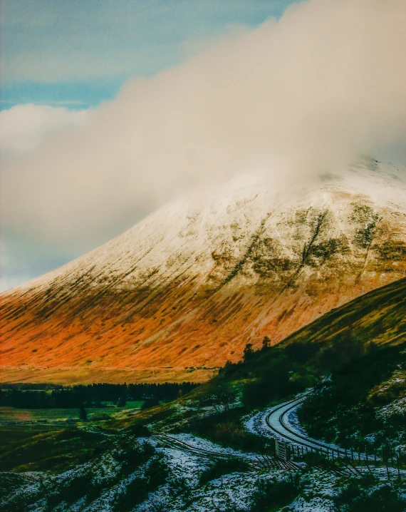 a mountain covered in snow and dust