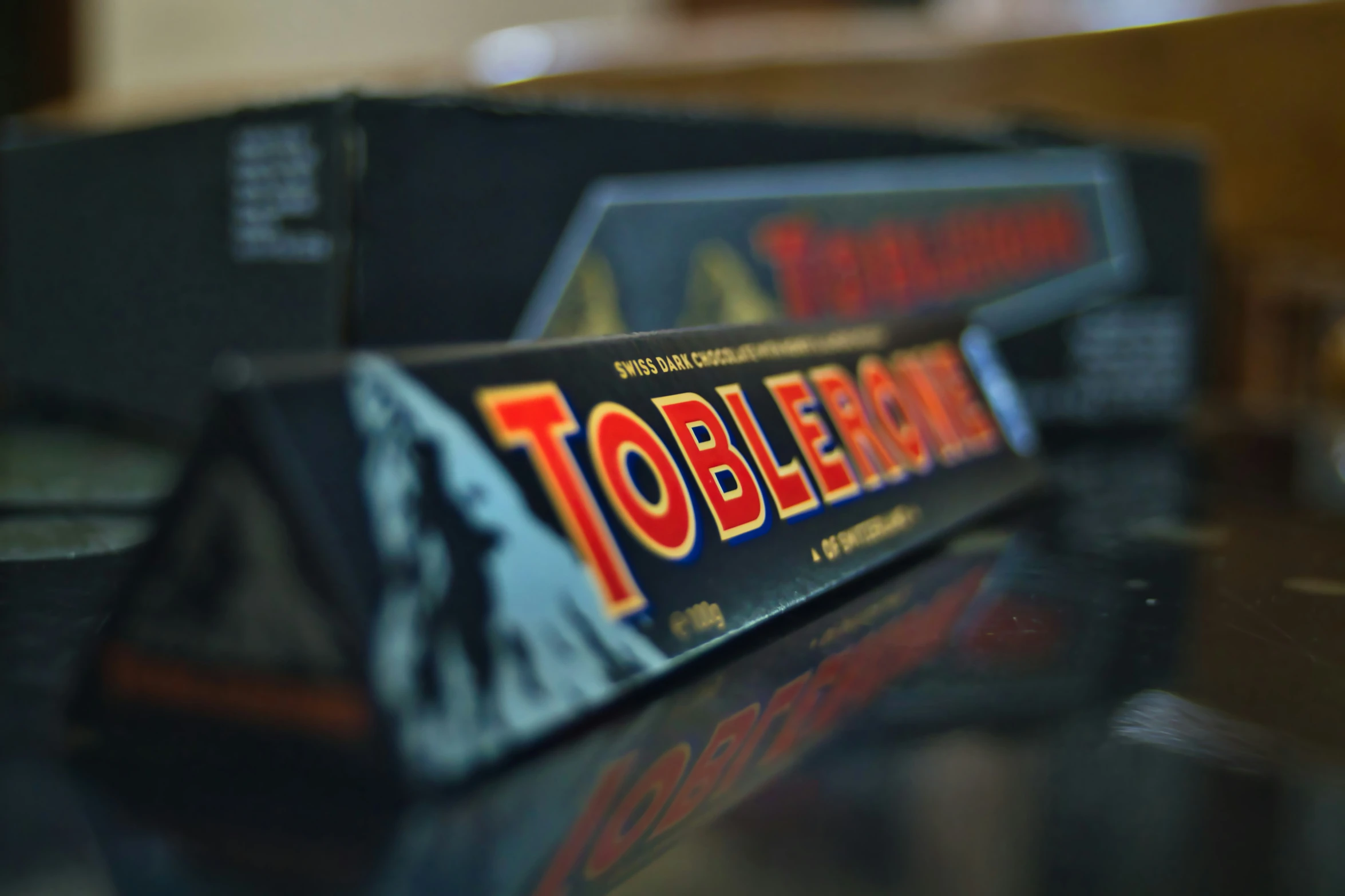 three boxes of tobler mache on a table