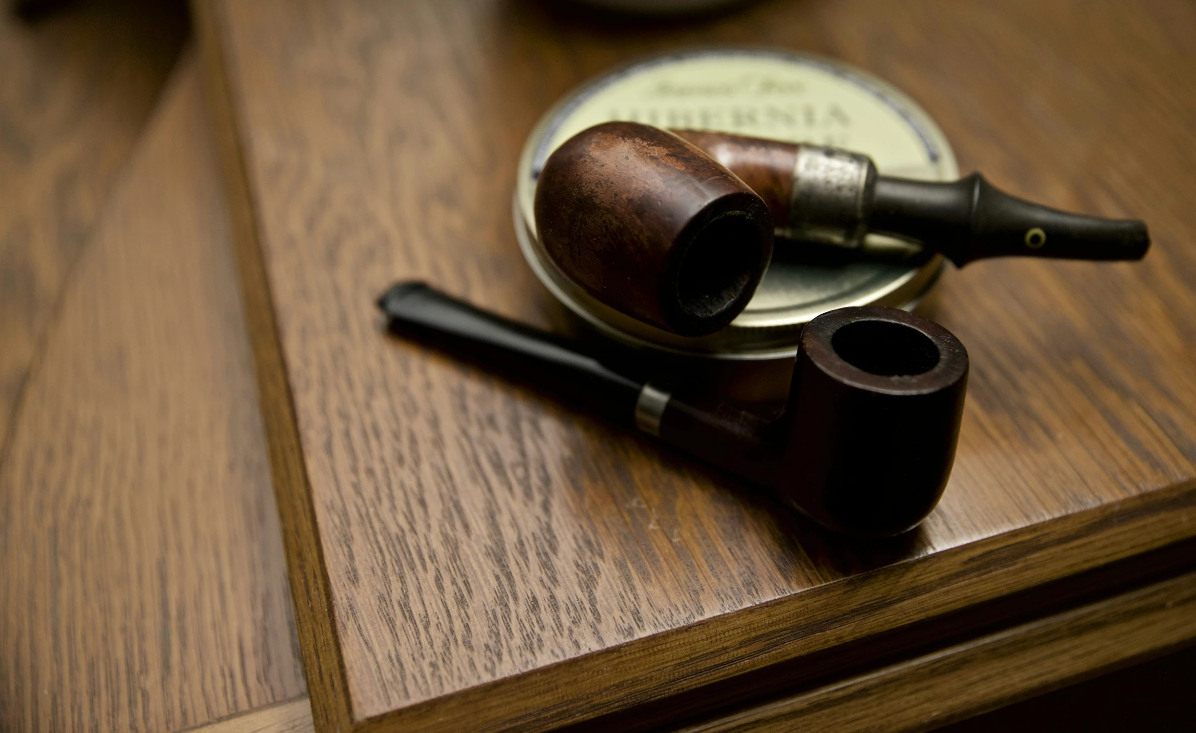 the pipes are resting on the table as if for some reason