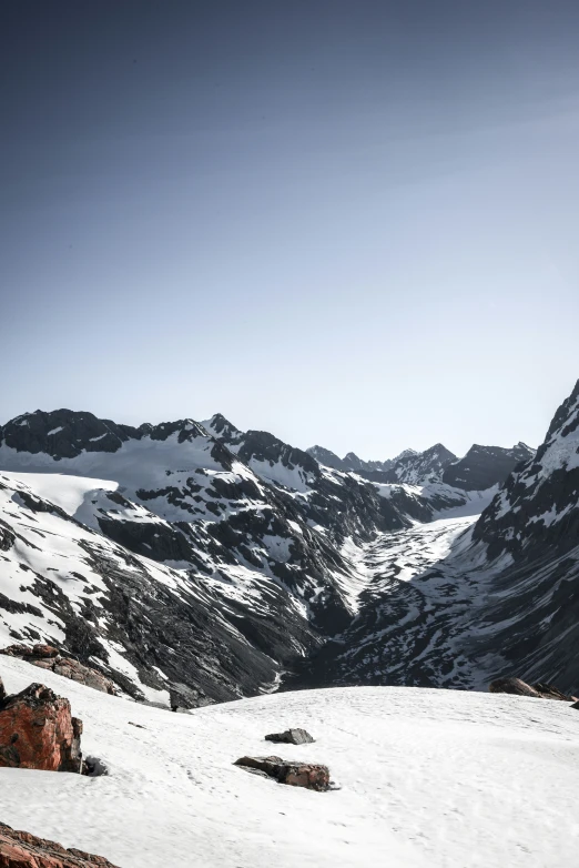 a skier skiing in the mountains with a great view