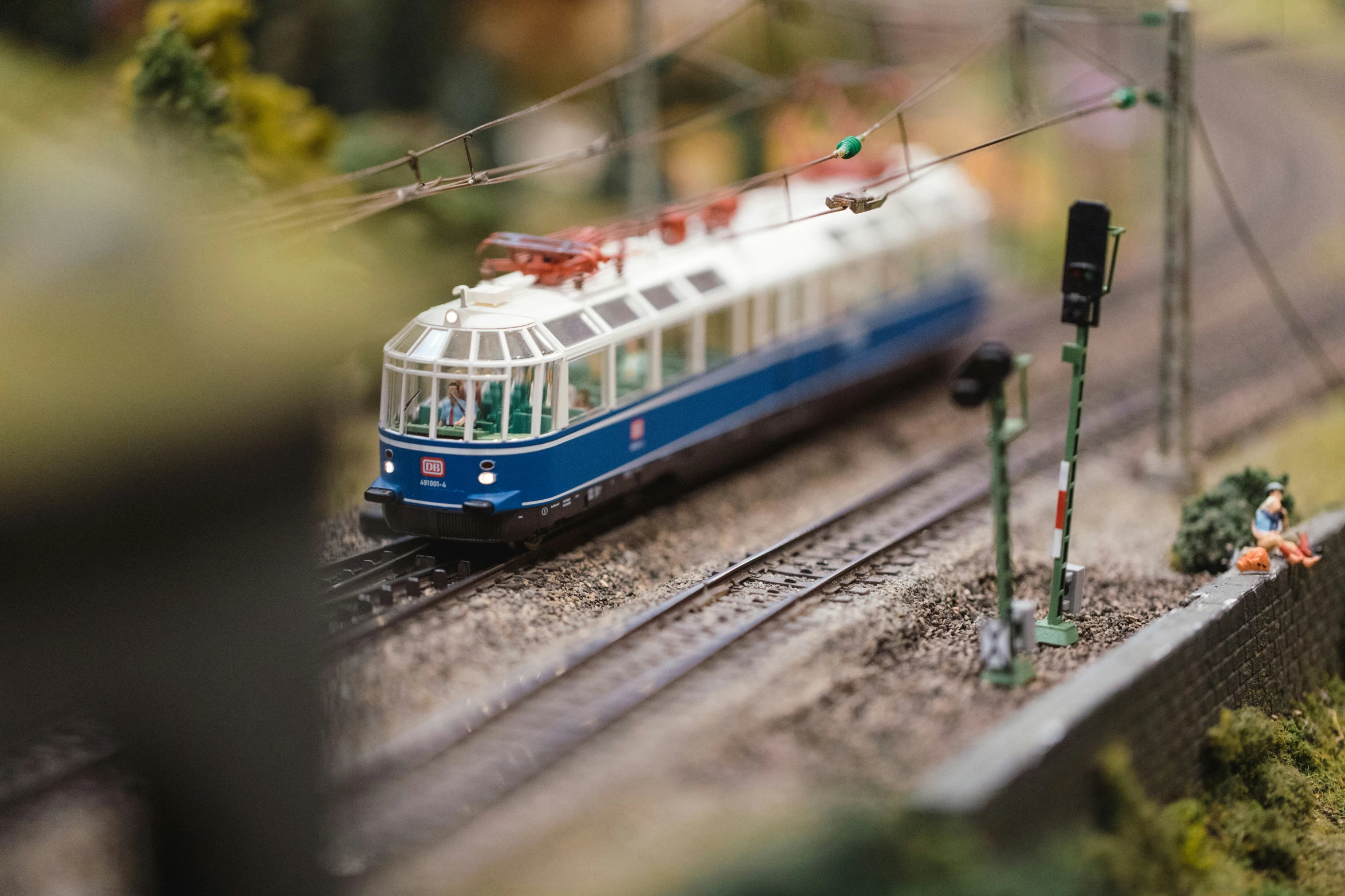 a toy model train that is on a train track