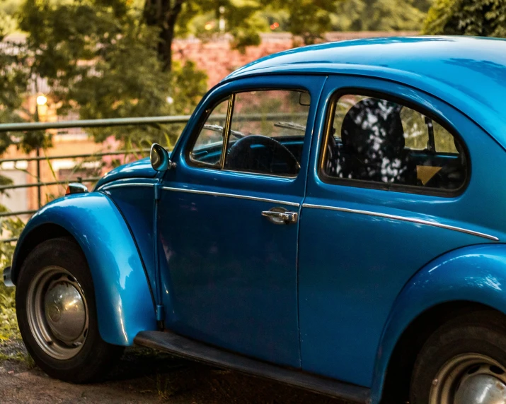 blue car with black and white checkered back window