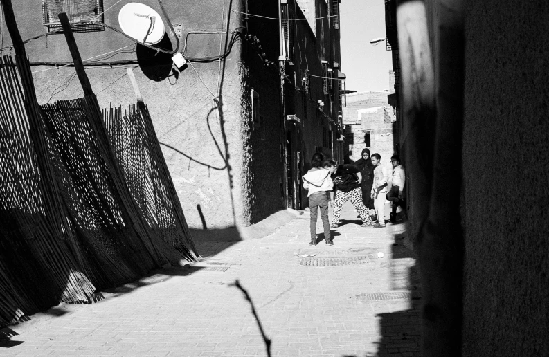 a long s of a city street with people on the side