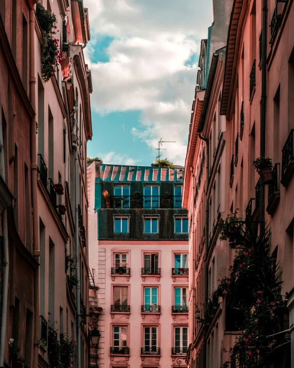 looking down the narrow alley way in an old european city