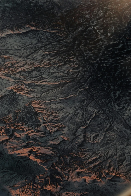 the earth's terrain at dusk looking very close to night