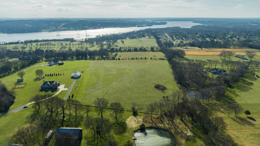 an aerial view of a farm in the country