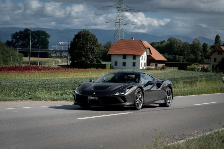 a black sports car parked on the side of the road