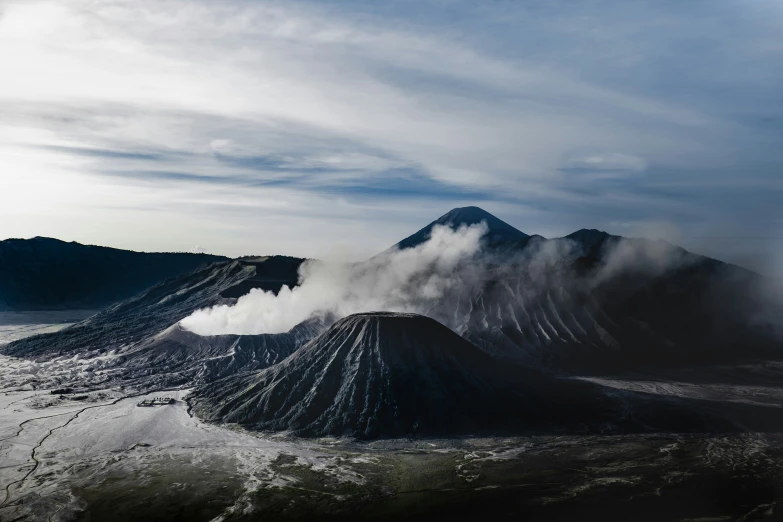 two very large, very high mountains on a mountain range