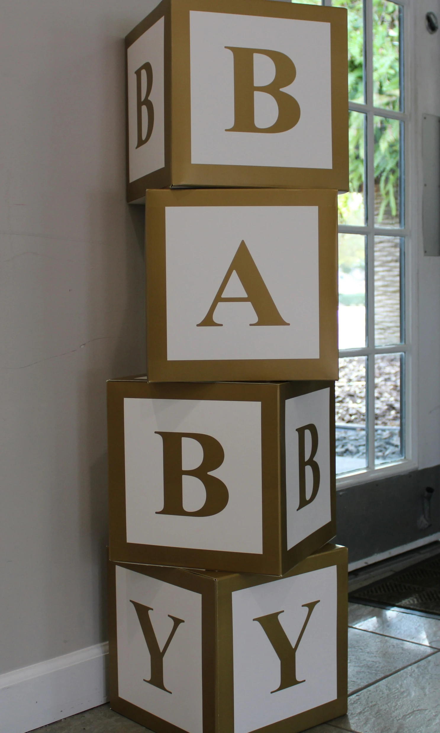 a display of blocks with the letters bah yb and e