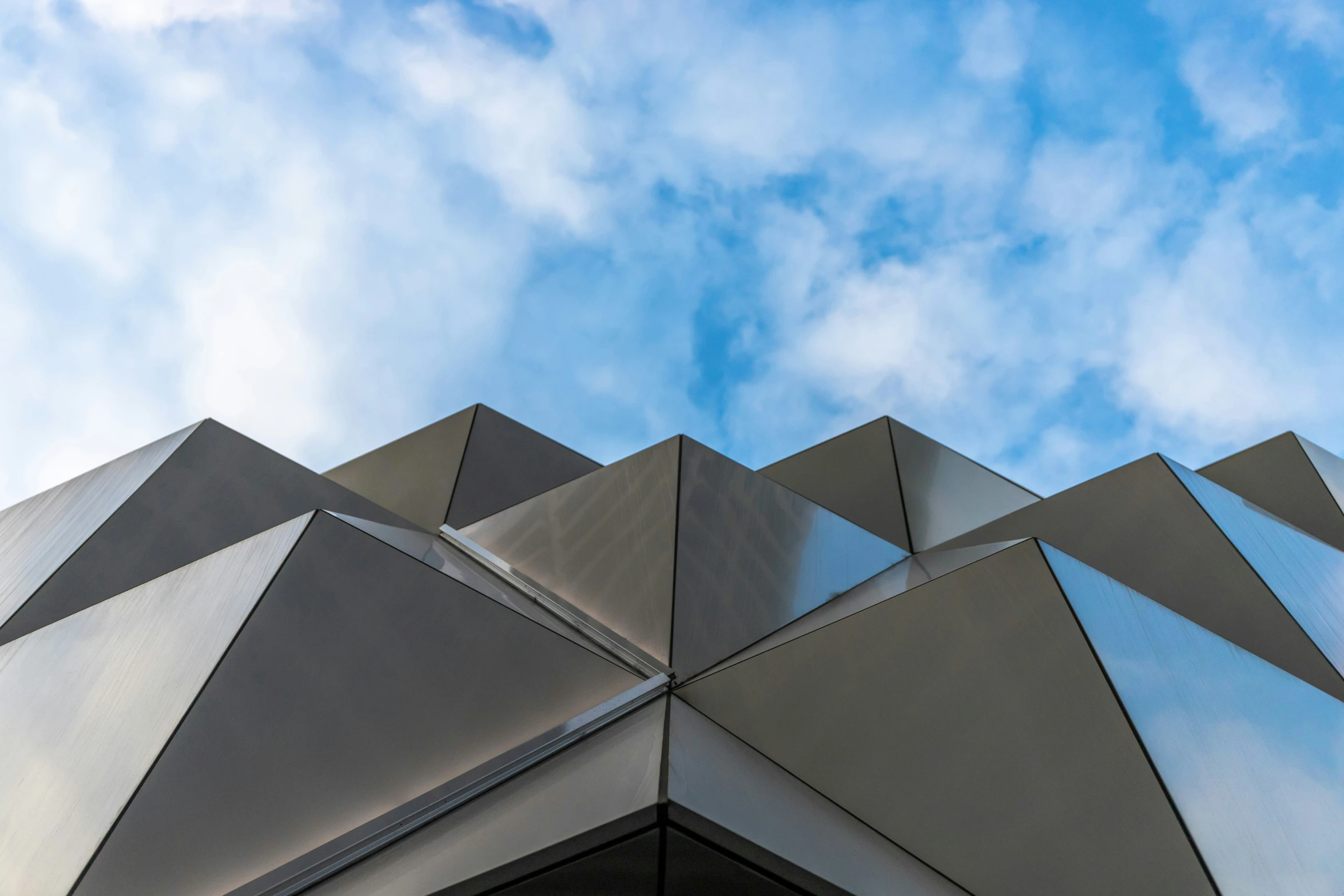 a building with a blue sky in the background