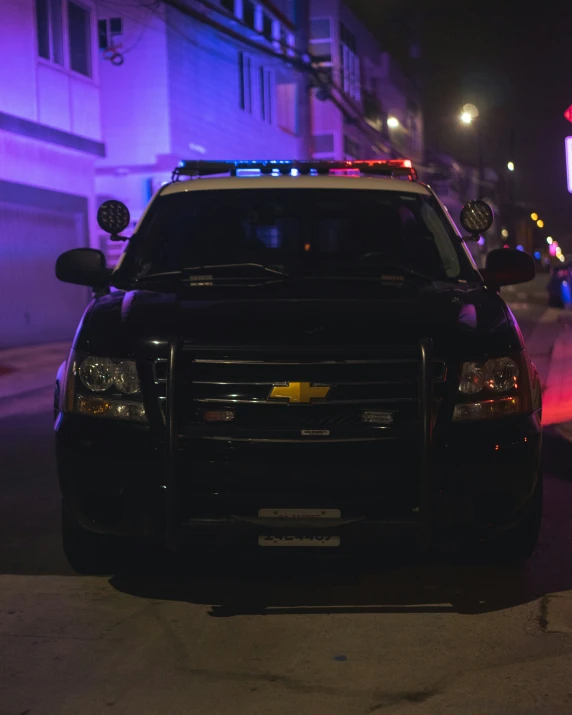 a police car parked on the side of the street