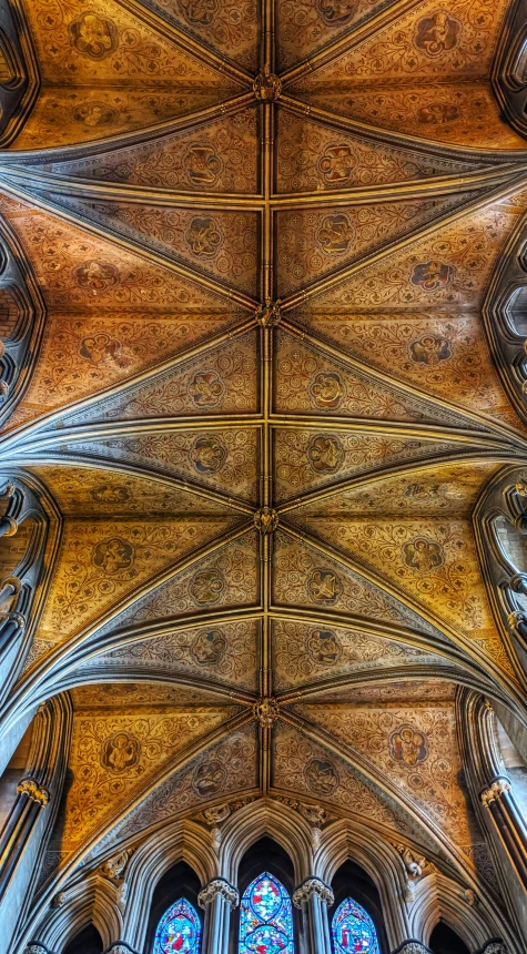 an elegant ceiling is covered in intricate designs