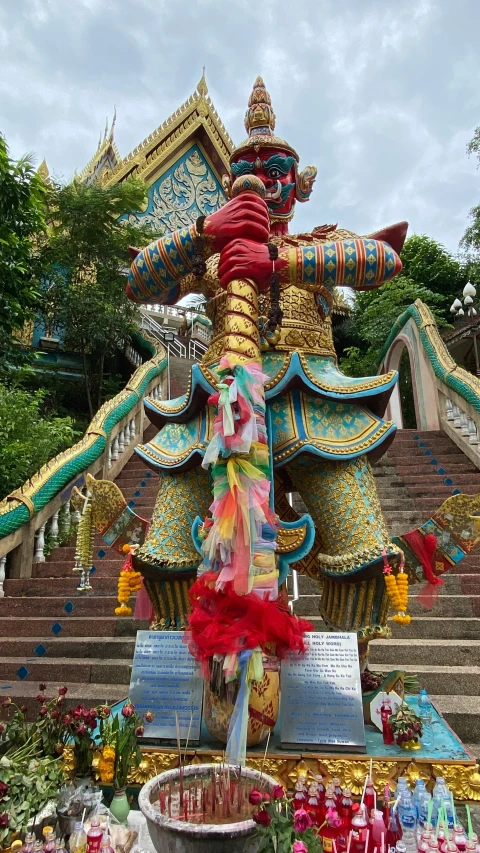 a colorful float that is next to a building