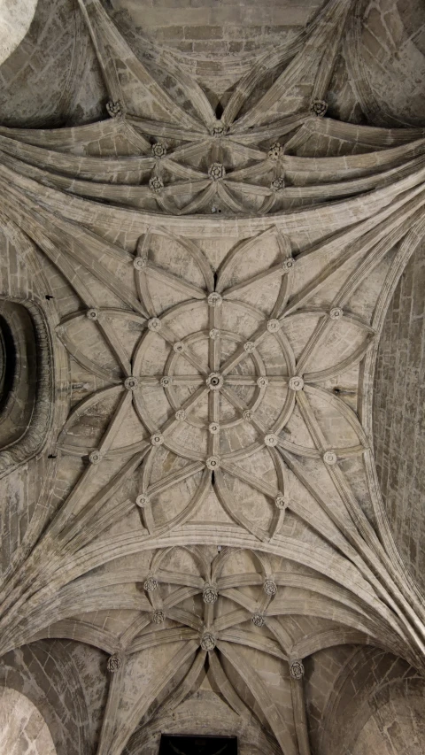 the ceiling inside the church is made of large stone