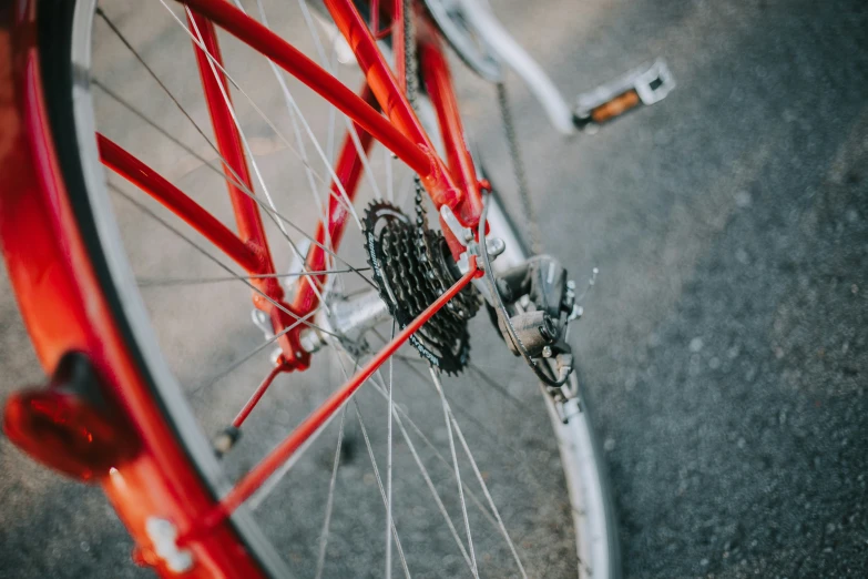 red bike with chain links attached to it