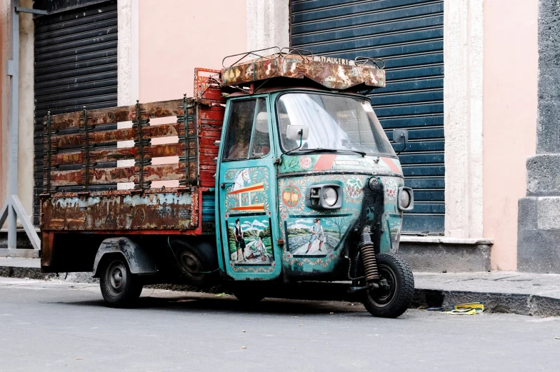 a truck with colorful paint on the side is parked