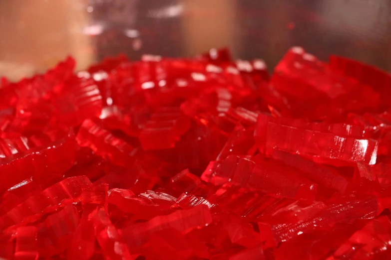 closeup of plastic red plastic pieces in the table