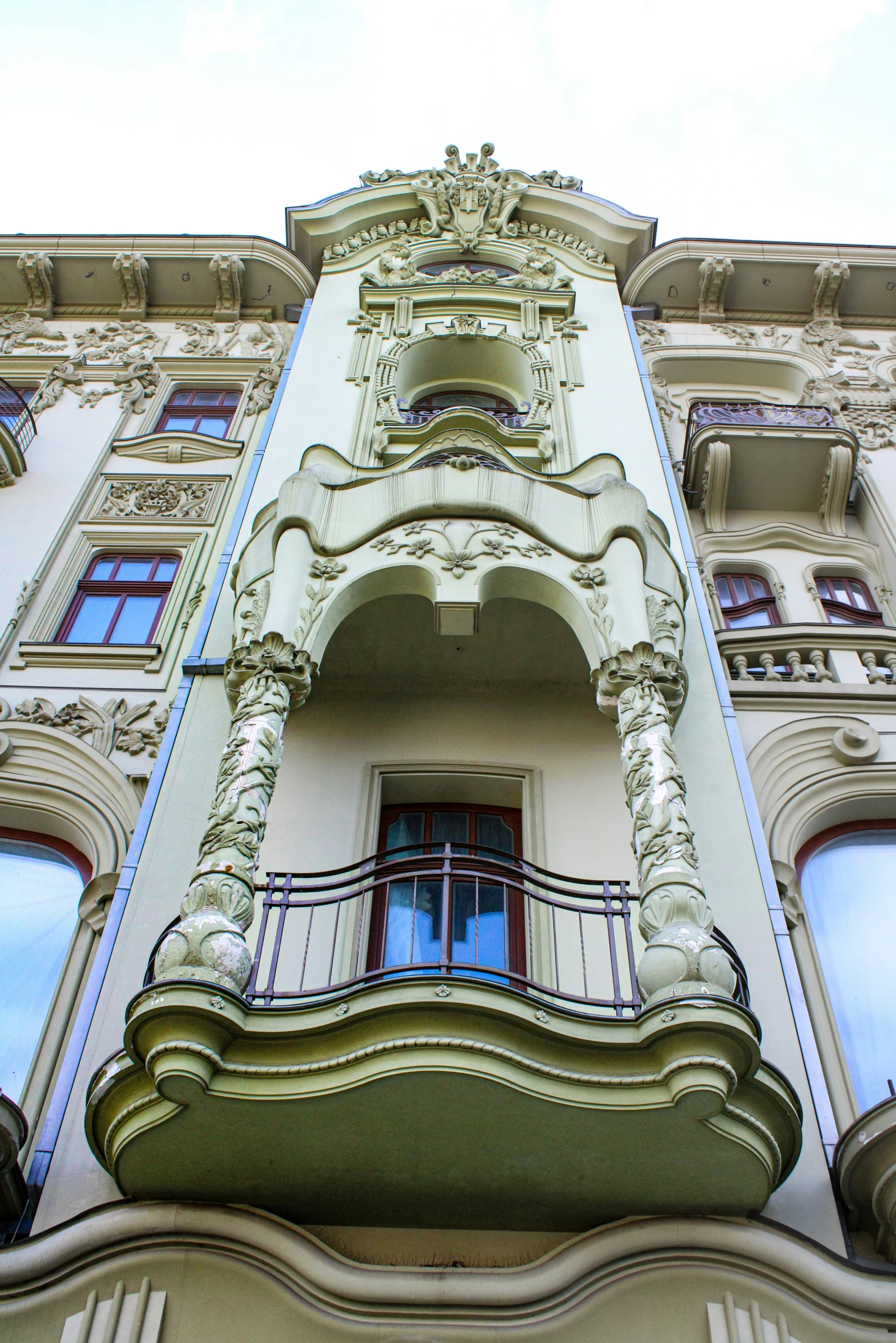 a fancy building is shown with several windows